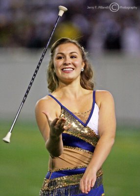 Georgia Tech Twirler performs as the band plays
