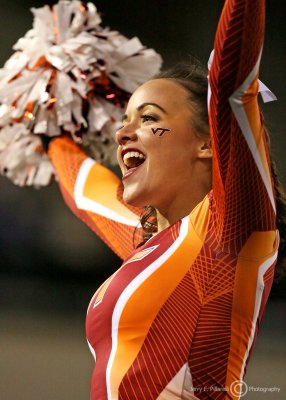 Virginia Tech Cheerleader performs on the sidelines