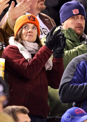 Hokies fan, disguised in an Auburn cap, blows her cover by applauding a VT gain