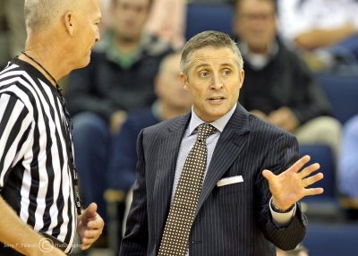 Georgia Tech Yellow Jackets Head Coach Brian Gregory discusses a play with a referee