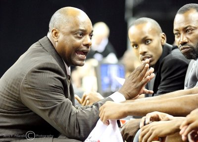 Delaware State Head Coach Greg Jackson makes a point to players on the bench during the game