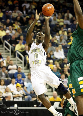 Jackets G Mfon Udofia shoots the jumper while going to his right