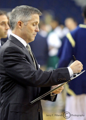 Georgia Tech Yellow Jackets Head Coach Brian Gregory draws up a play during a timeout