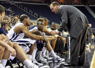 Georgia Tech Assistant Coach Josh Pastorino talks to players on the bench