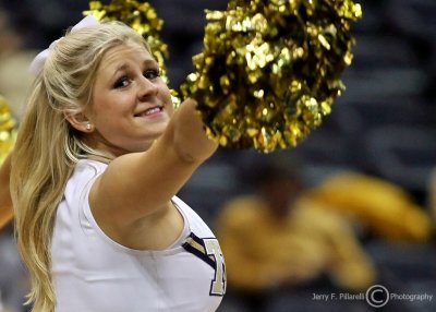 Georgia Tech Cheerleader warms up the crowd during a timeout