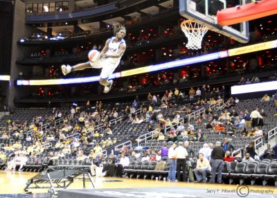 A SkyTeam member launches himself for a monster dunk