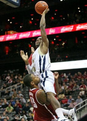 …Jackets G Reed draws the blocking foul from Tide G Jacobs