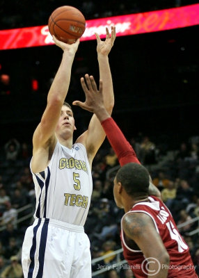 Georgia Tech C Daniel Miller shoots a jumper over Alabama F Jacobs