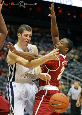 Georgia Tech C Miller looses the ball to Alabama defender G Andrew Steele