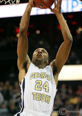 Jackets F Hosley goes to the basket for an uncontested dunk