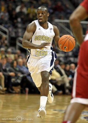 Georgia Tech G Udofia drives the ball up court