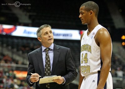 Georgia Tech Yellow Jackets Head Coach Brian Gregory discusses strategy with G Morris