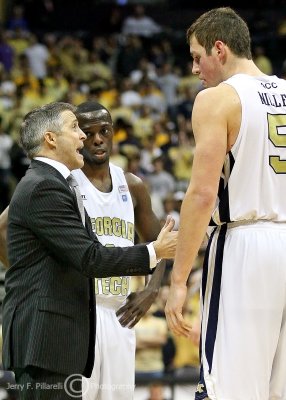 Georgia Tech Yellow Jackets Head Coach Brian Gregory talks to his players during a timeout