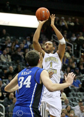 Jackets F Royal shoots over Blue Devils F Kelly