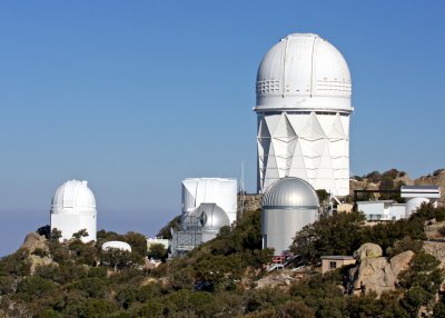 The 4 Meter Telescope dwarfs buildings housing smaller telescopes