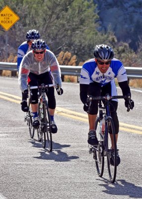 Cyclists coming down from their ride up to Kitt Peak
