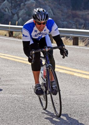 Cyclist on the mountain road from Kitt Peak