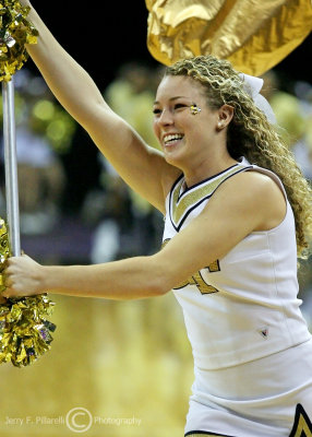 Jackets cheerleader charges onto the court before tipoff