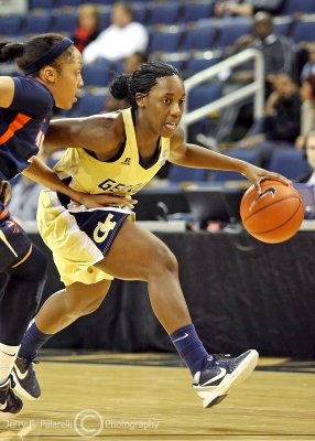 Georgia Tech PG Walthour moves the ball around the perimeter with a Virginia defender in tow