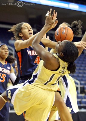 Virginia C Egwu wrestles with Georgia Tech F Marshall for a loose ball under the basket