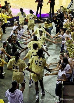Georgia Tech players are welcomed onto the floor at Gwinnett Arena