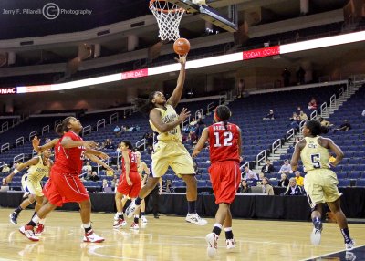 Jackets C Goodlett drives into the lane for the layup