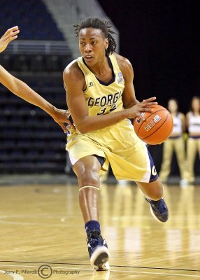 Georgia Tech F Regins dribbles at the top of the three point line