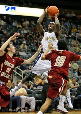 Georgia Tech G Mufon Udofia elevates and shoots over Boston College G John Cahill