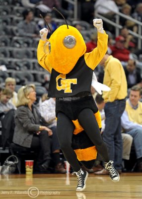 Georgia Tech Mascot Buzz warms up the crowd during a timeout