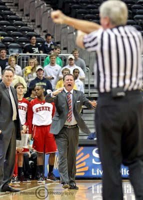 North Carolina State Head Coach Mark Gottfried is enraged by an intentional foul call on one of his players