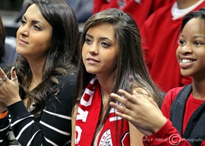 North Carolina State Fan watches her team