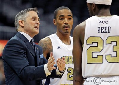 Georgia Tech Yellow Jackets Head Coach Brian Gregory talks to his players during a timeout