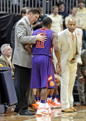 Clemson Tigers Head Coach Brad Brownell talks to G Young as he comes out of the game