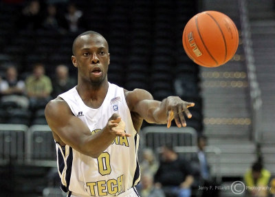 Tech G Mufon Udofia delivers a pass to a teammate down low