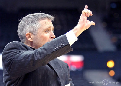 Georgia Tech Yellow Jackets Head Coach Brian Gregory signals in a play to his players