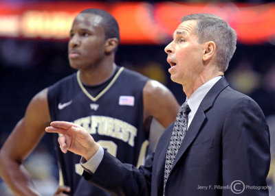 Wake Forest Demon Deacons Head Coach Jeff Bzdelik makes a point to his players on the floor