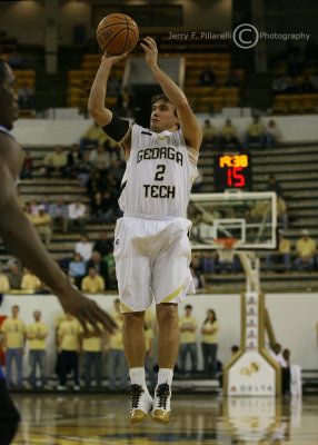 Yellow Jackets G Matt Causey takes a jumper from the top of the key