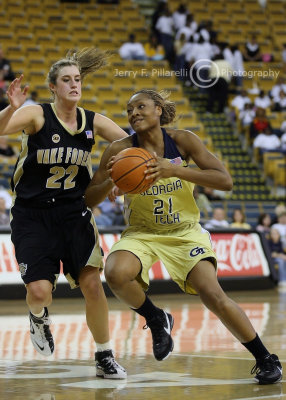 Georgia Tech F Janie Mitchell drives around Wake Forest F Christen Brown