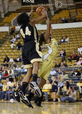 Jackets F Mitchell goes up with Wake F Mekia Valentine defending