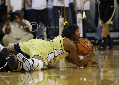 Georgia Tech G Jacqua Williams dives to the floor to come up with a loose ball