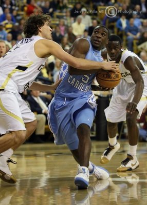 GT G Causey tries to stop the driving UNC G Lawson