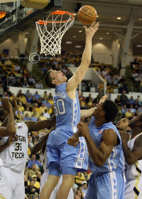 Tar Heels F Hansbrough puts up a reverse lay up in a crowd