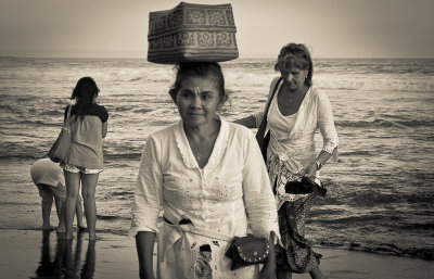 Women on the beach, Tanah Lot Temple, Bali