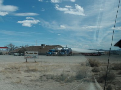 Turbine blades on flatbed trucks.