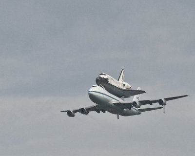 ..... first view of the shuttle Discovery mounted atop a Boing 747 modified by NASA to carry the shuttles when they had to be mo