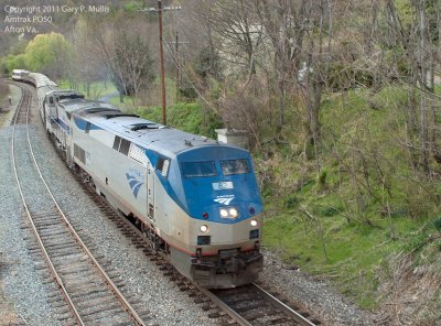 Rare to see two Amtrak units leading but also rare with two FRA cars on the rear.tif