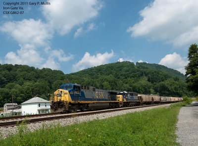 A grain train at Iron Gate with a Spirit and an SD40-2 copy.jpg