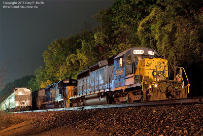 A grain empty with 2 SD40-2s is in the siding another is on the main. copy.jpg