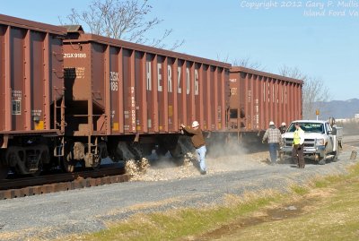 Ballast train begins dumping.tif