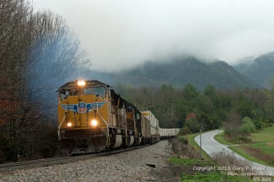 UP units lead 202 with fog hanging on the mountains. copy.jpg